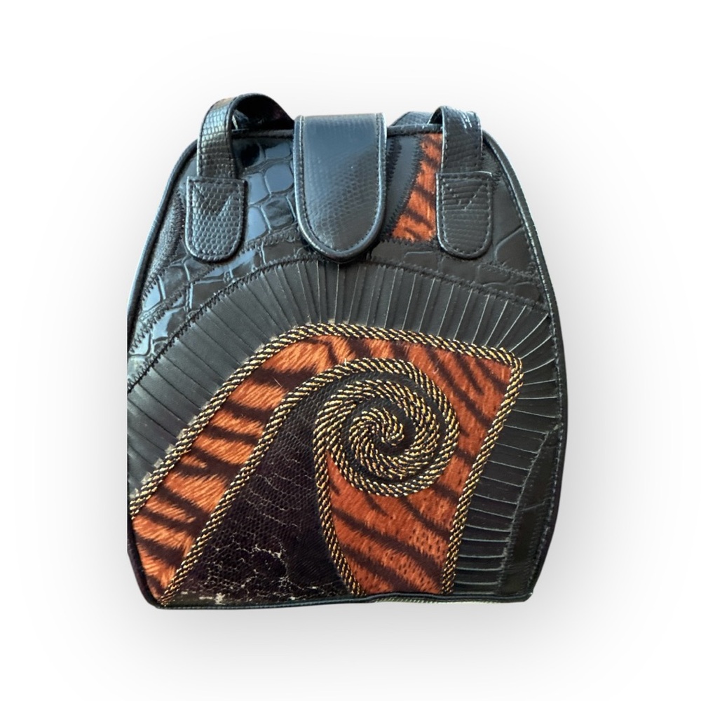 Stylish Black and Brown Satchel with Decorative Pattern